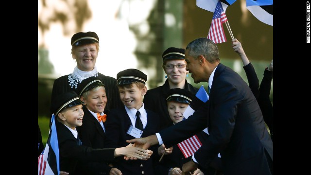 Children welcome Obama to Kadriorg Palace in Tallinn on September 3. Obama's visit to Estonia sought to reassure nervous Eastern European nations that NATO's support for its member states is unwavering.