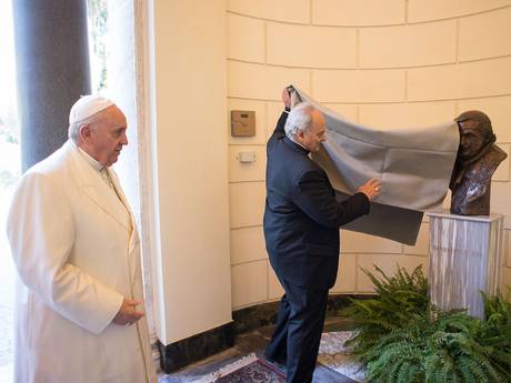 Pope Francis look on during the unveiling of a bronze bust in honor of Pope Benedict XVI on October 27, 2014 at the Vatican