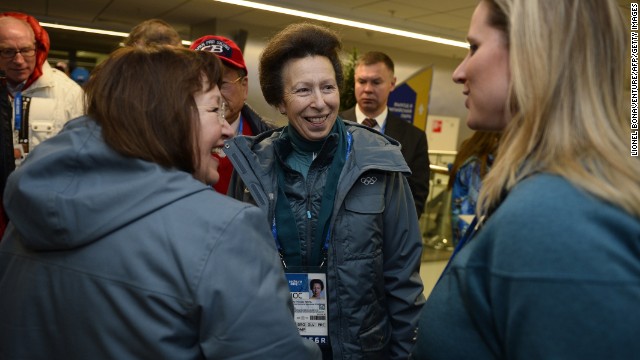 Britain's Princess Anne, center, talks with people upon arriving for the opening ceremony.