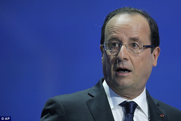 France, the largest country in the EU, is being held back by a 'bloated public sector', according to the IMF, and huge public spending under socialist President Francois Hollande (pictured)