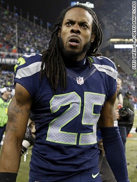 Richard Sherman is an NFL star that never misses an opportunity to trumpet his own abilities. The Seattle Seahawks star is outspoken on Twitter too, and has enjoyed recent back and forths with Arizona Cardinals Patrick Peterson. The two cornerbacks clashed again after Peterson signed a new deal with the Cardinals, Sherman responding by tweeting a picture of his Superbowl ring. I'm having fun with it, Peterson said. Sometimes it seems like he's a little salty about it.