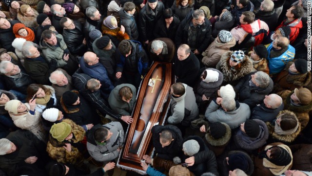 Some 10,000 Ukrainians take part in the funeral ceremony of dead protester Yuri Verbytsky in the western city of Lviv on Friday, January 24.