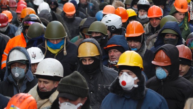 Protesters march in Kiev on Monday, January 27. Activists say they want wide-ranging constitutional reform and a shake-up of the Ukrainian political system.