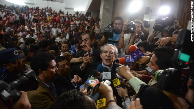 Former Guatemalan dictator Efrain Rios Montt talks to the media in Guatemala City, on May 10, 2013, after being convicted on charges of genocide allegedly committed during his regime. It was the first time, anywhere in the world, that a former head of state was being tried for genocide by a national tribunal, according to the United Nations. The conviction was overturned 10 days later. 