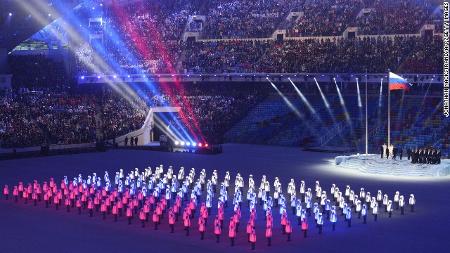 Performers' jackets light up to form the Russian flag.