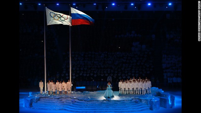 Russian soprano Anna Netrebko sings the Olympic Anthem.