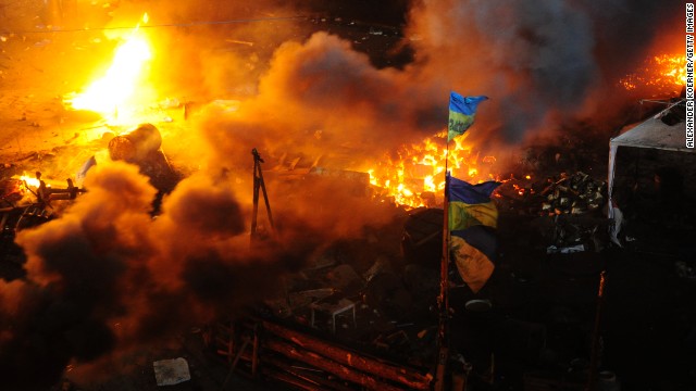 The central square in the capital of Ukraine is engulfed in flames during clashes between protesters and riot police early on Wednesday, February 19. Thousands of anti-government demonstrators have packed Independence Square since November, when President Viktor Yanukovych reversed a decision to sign a trade deal with the European Union and instead turned toward Russia.