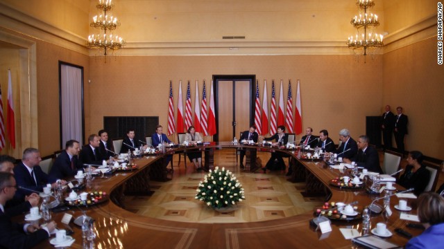 Obama, at right, is seated with a U.S. delegation as he participates in a bilateral meeting with Polish Prime Minister Donald Tusk and the Polish delegation in Warsaw on June 3. While in Poland, Obama announced he would ask Congress for $1 billion to be put toward bolstering NATO's security alliance in Europe.