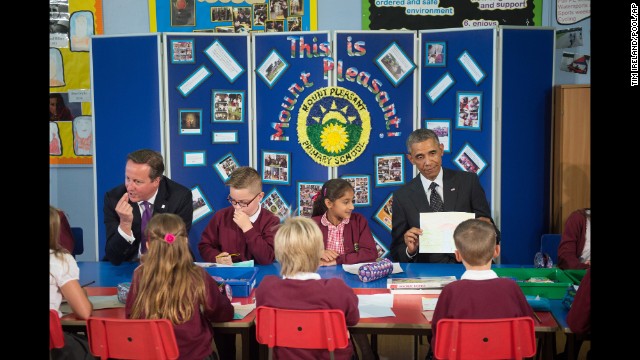 Obama and Cameron meet with schoolchildren in Newport on September 4 before attending the NATO summit.