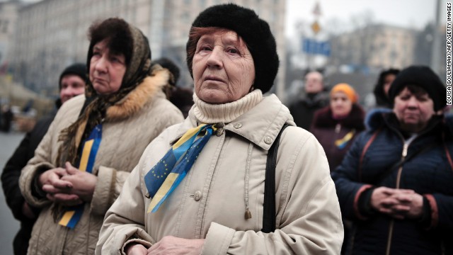 People attend a morning prayer service at Independence Square in Kiev on March 2. 
