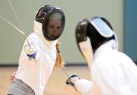 From left: Twin Peaks Charter Academy junior Rachelle Fagerburg practices with junior Eric Herrera during fencing practice Tuesday.