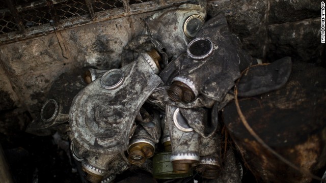 Gas masks used by protesters sit next to a barricade in Independence Square on February 24.