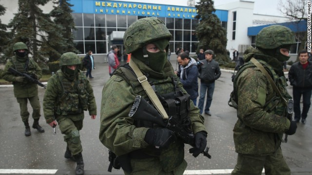 Armed men patrol outside the Simferopol International Airport in Ukraine's Crimea region on Friday, February 28. Simferopol is the regional capital.
