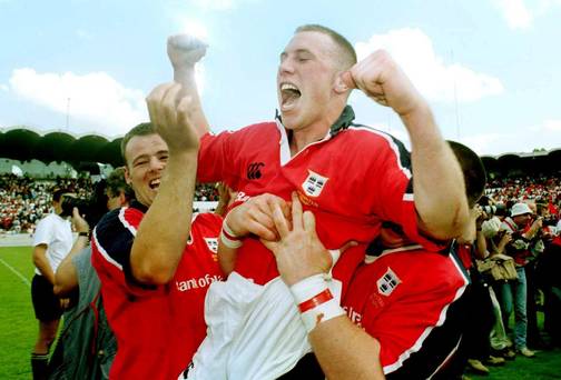 Munster scrum-half Peter Stringer celebrates victory over Toulouse with team-mates John O'Neill, left, and Marcus Horan, 2000 Heineken European Cup semi-final