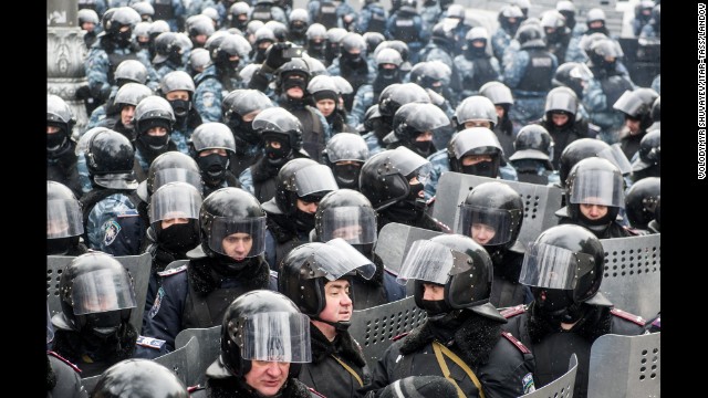 Riot police officers gather in Kiev on January 23.