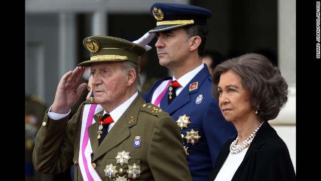 Spain's King Juan Carlos I, left, announced Monday, June 2, that he would be handing over the throne to Crown Prince Felipe, center. Juan Carlos, 76, oversaw Spain's transition from dictatorship to democracy after the death of Francisco Franco in 1975.