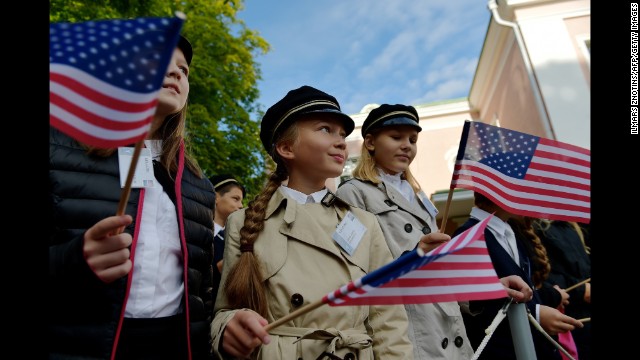 Estonian children waving American flags await Obama's arrival at Kadriorg Palace on September 3.