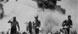 "USS <em>Bunker Hill</em> hit by two Kamikazes in 30 seconds on 11 May 1945 off Kyushu." (detail)” /></a> <br clear=
